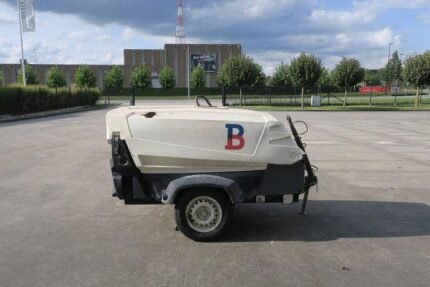 Atlas Copco XAS5700 portable diesel air compressor for industrial applications